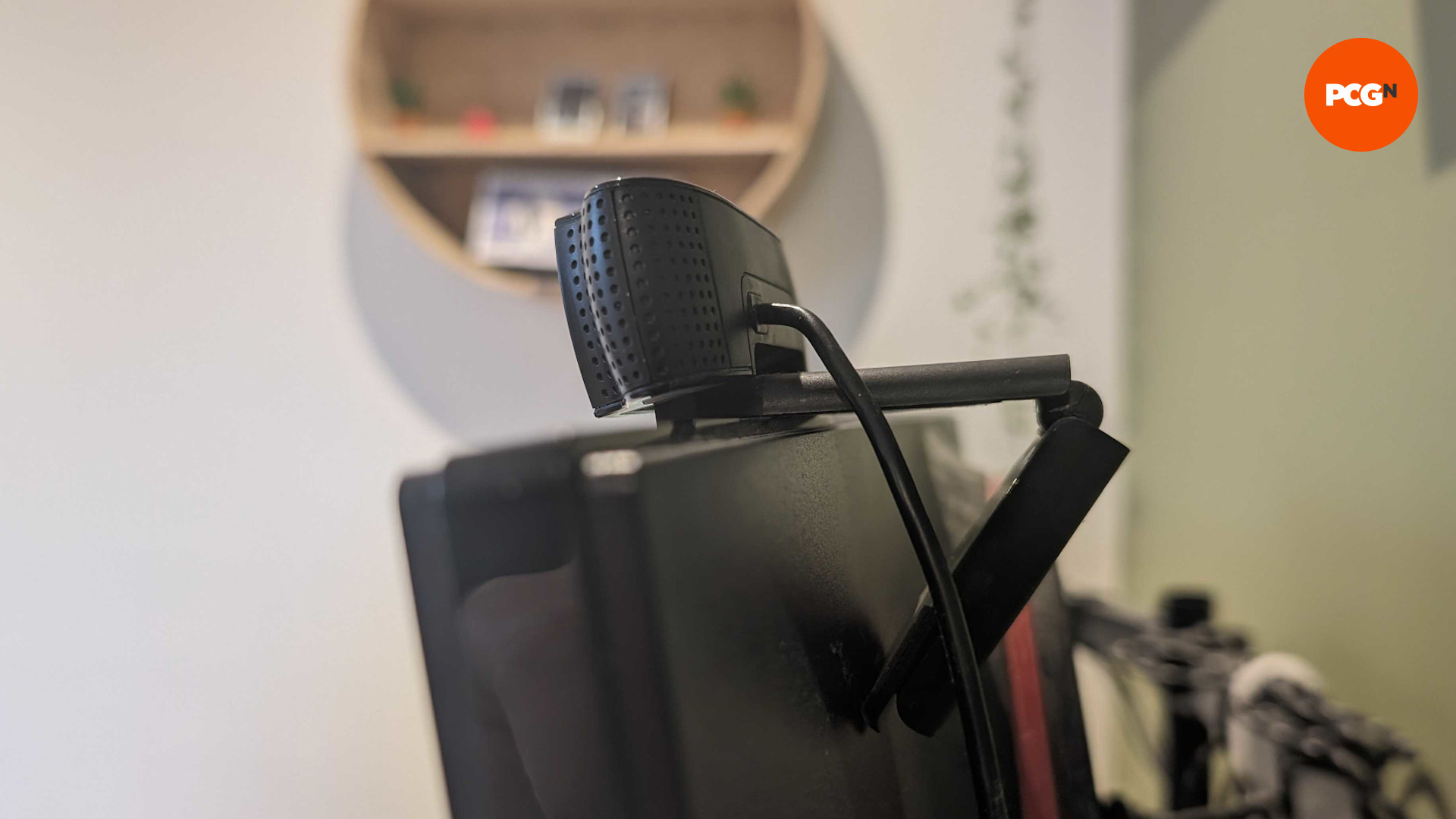 Side view of the Logitech C920 HD Pro webcam on top of a PC monitor