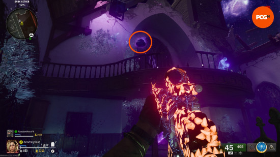 An orange circle hightlight a floating hat, one of the crafting items required in the Black Ops 6 Zombies Liberty Falls main quest.