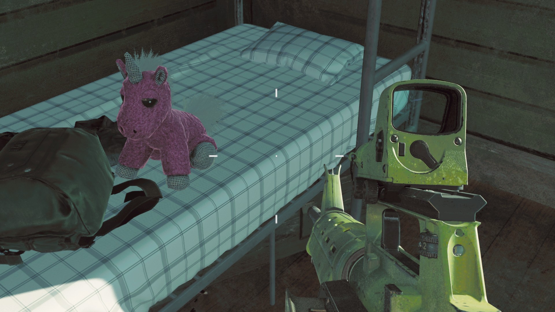 A pink unicorn stuffy sitting on a bed in Terminus Black Ops 6 Zombies.