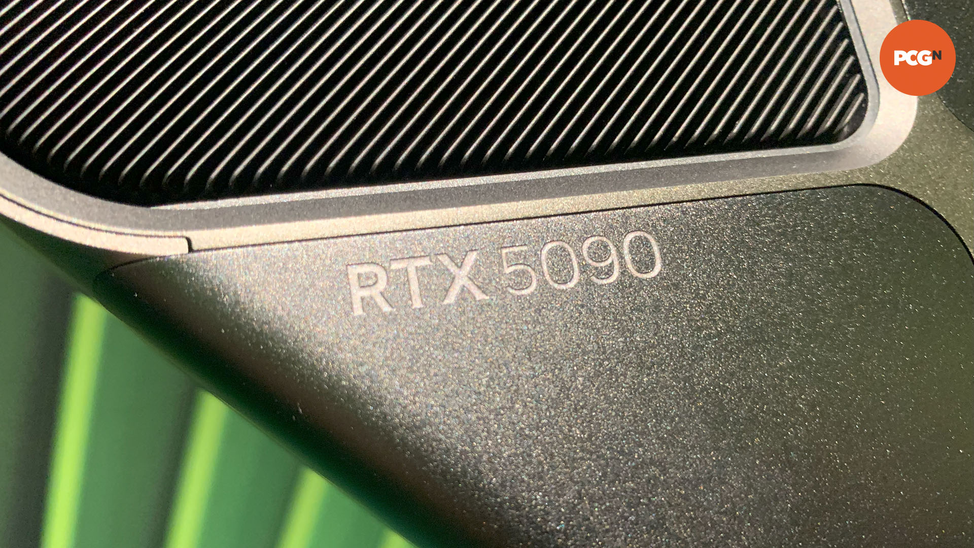 Nvidia GeForce RTX 5090 guide: Closeup of text on cooler, taken from CES 2025.